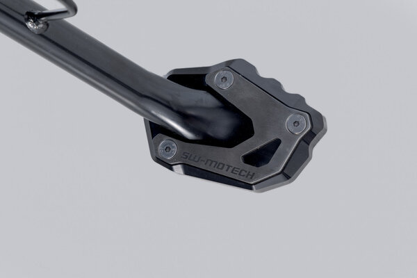 Base maggiorata per cavalletto laterale Argento/Nero. Suzuki V-Strom 1050DE, April RS 457.