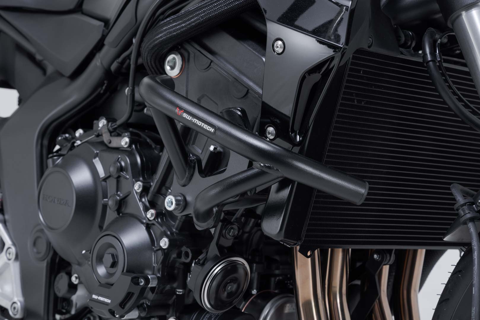 Protecciones laterales de motor Negro. Honda CB1000 Hornet (24-).