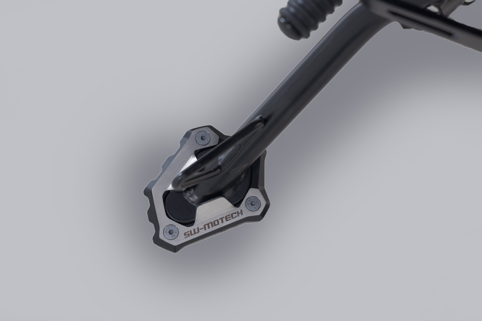 Extension para caballete lateral Negro/plateado. Triumph Scrambler 1200 X (23-).