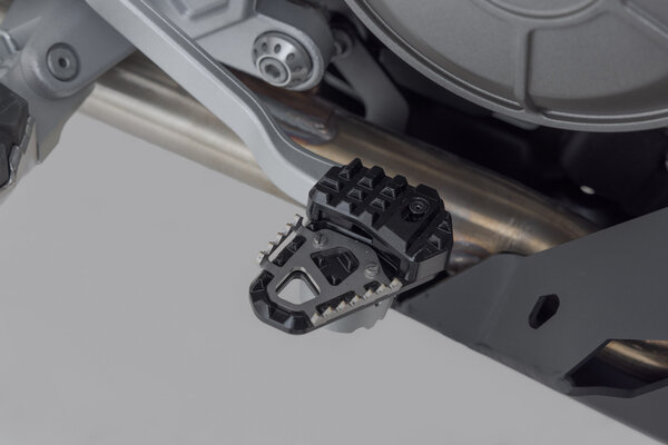 Extensión del pedal de freno Negro. Aprilia Tuareg 660 (21-).