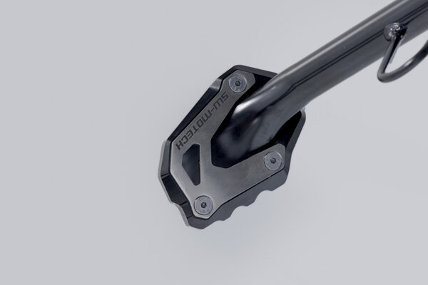 Base maggiorata per cavalletto laterale Argento/Nero. Suzuki V-Strom 1050DE, April RS 457.