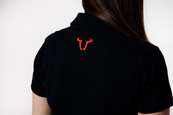 Polo team Core Line. Noir. Dames. Taille L.